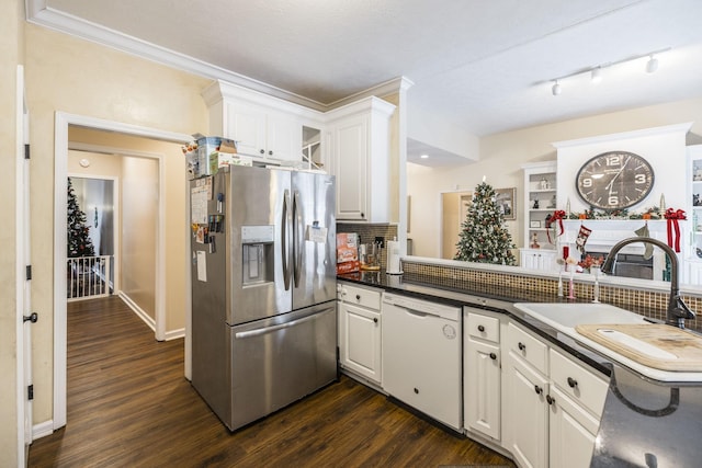 kitchen featuring stainless steel fridge, white dishwasher, white cabinetry, and dark hardwood / wood-style floors