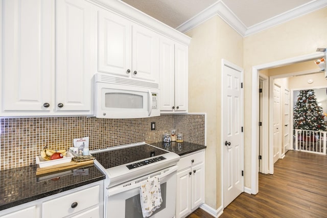 kitchen with white cabinetry, dark hardwood / wood-style flooring, and white appliances