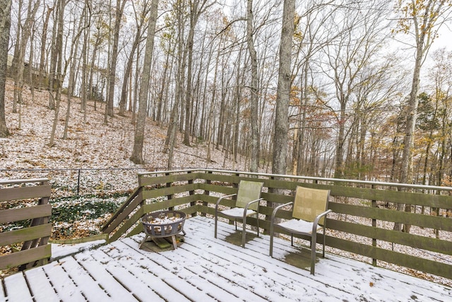 view of snow covered deck