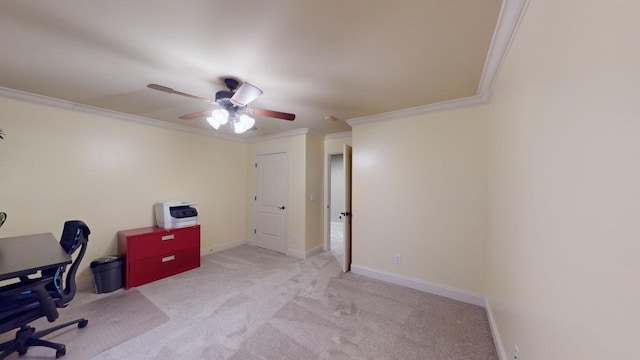 carpeted home office with ceiling fan and ornamental molding