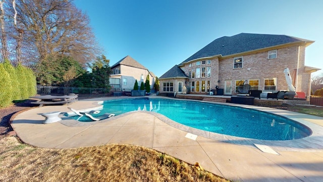 view of pool with an outdoor hangout area and a patio area