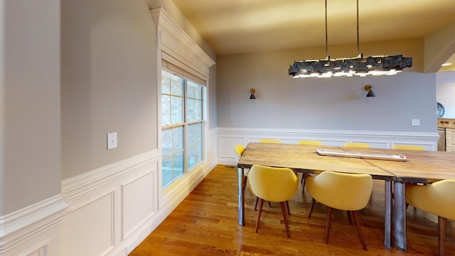 dining area featuring hardwood / wood-style floors