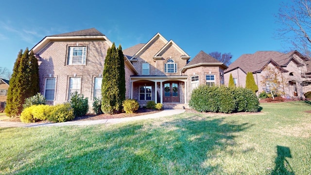 view of front of house with a front lawn