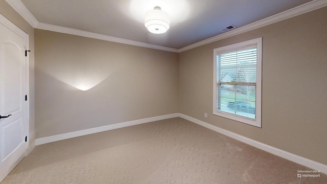 carpeted empty room with ornamental molding