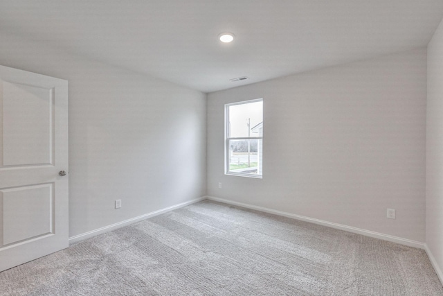 view of carpeted spare room