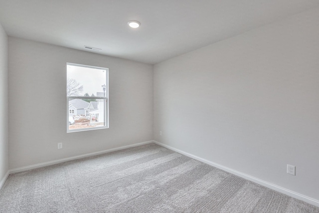 view of carpeted spare room