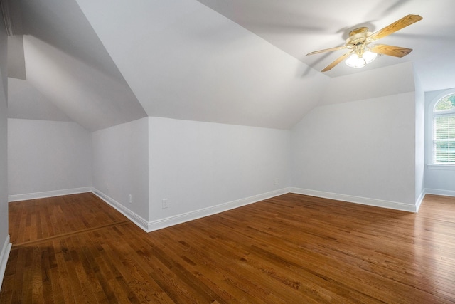 bonus room featuring hardwood / wood-style flooring, vaulted ceiling, and ceiling fan