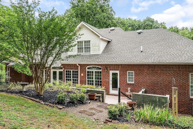 back of property featuring a patio area