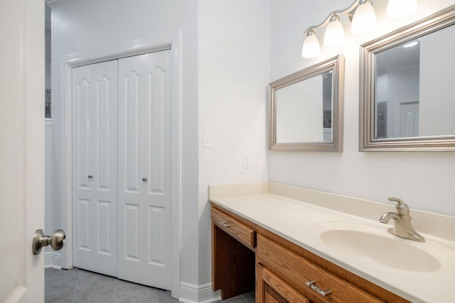 bathroom featuring tile patterned floors and vanity