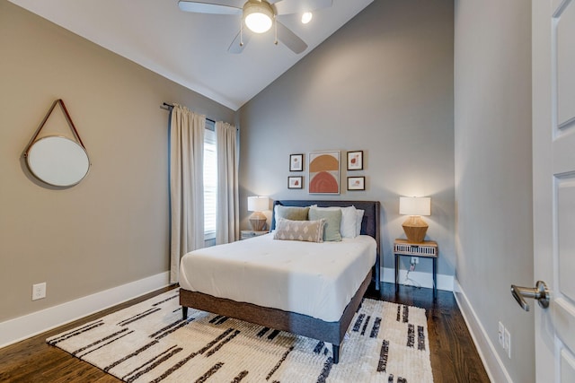 bedroom featuring hardwood / wood-style floors, ceiling fan, and high vaulted ceiling