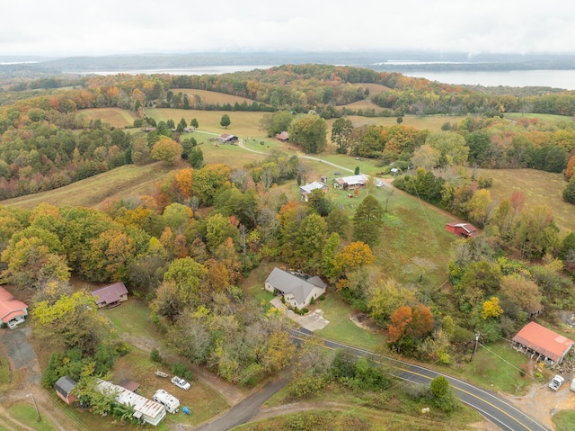 drone / aerial view with a rural view and a water view