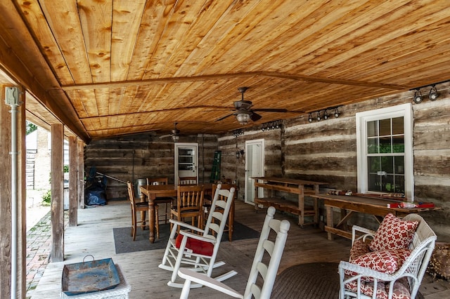 exterior space with ceiling fan