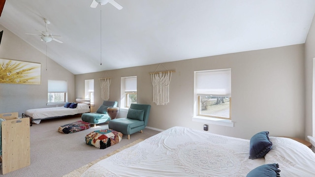 bedroom with carpet flooring, ceiling fan, and high vaulted ceiling