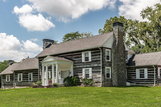 view of front of home with a front yard