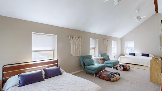 bedroom featuring carpet, ceiling fan, and high vaulted ceiling