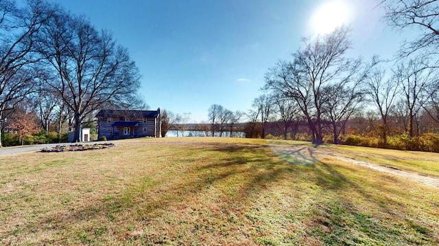 view of yard with a water view