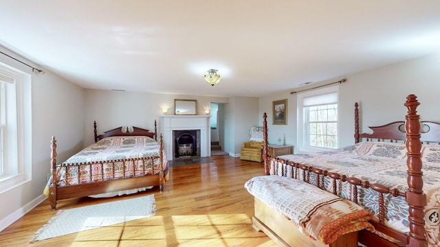 bedroom with light wood-type flooring