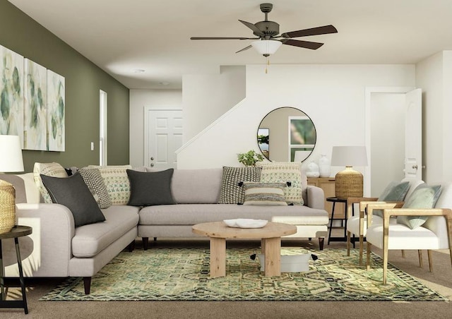 carpeted living room with ceiling fan