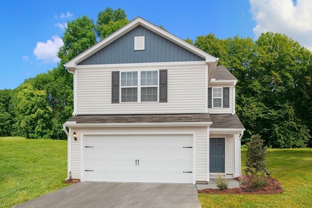 view of front facade featuring a garage and a front lawn