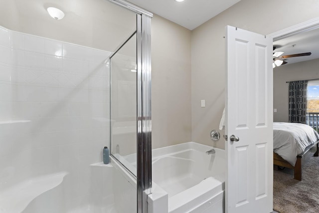 bathroom with separate shower and tub and ceiling fan