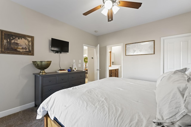 carpeted bedroom featuring connected bathroom and ceiling fan