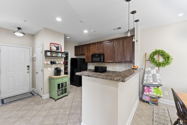 kitchen with black appliances, kitchen peninsula, tasteful backsplash, decorative light fixtures, and dark brown cabinets