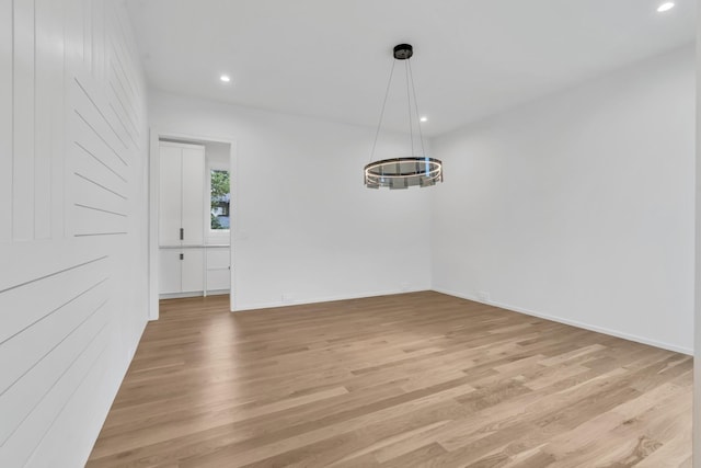 unfurnished dining area with light hardwood / wood-style floors