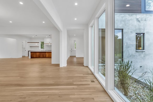 hallway featuring light hardwood / wood-style flooring