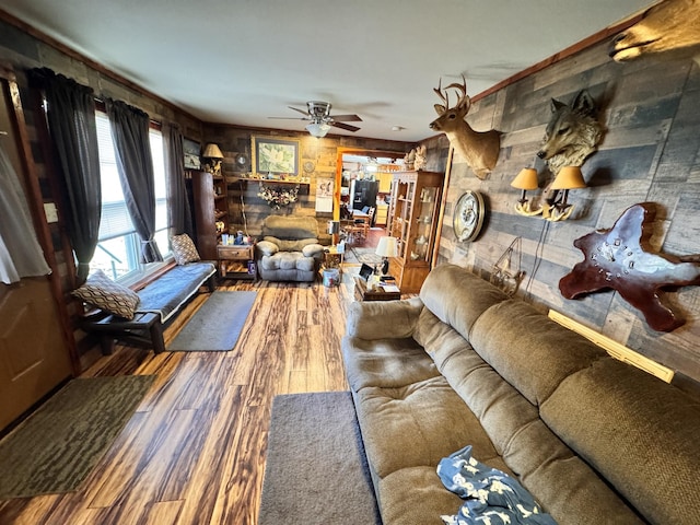 living room with hardwood / wood-style floors and ceiling fan