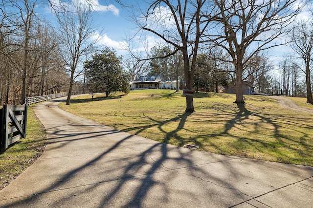 view of road with driveway