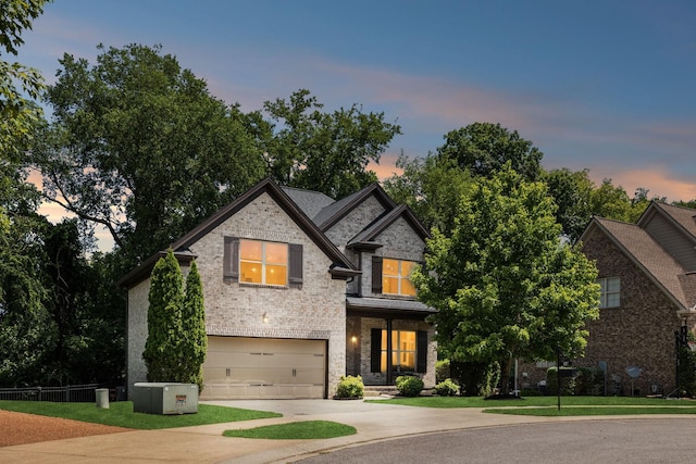 view of front of property featuring a garage