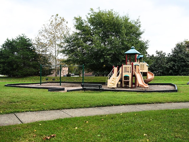 view of playground with a yard