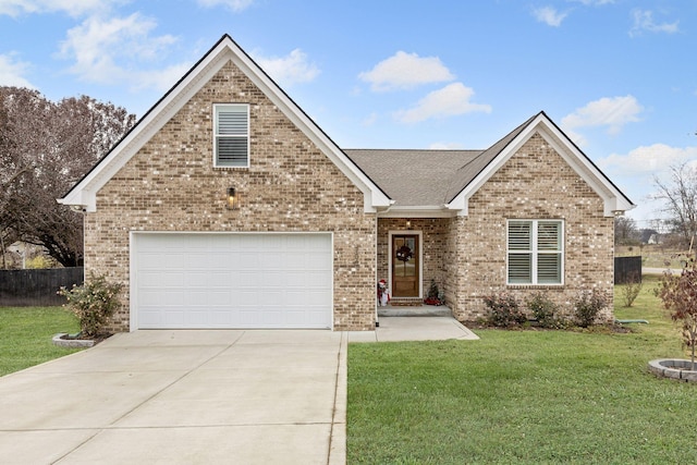 view of front of home with a front lawn and a garage