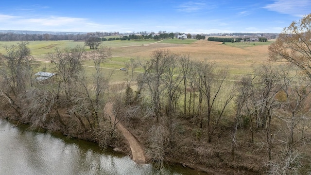 drone / aerial view with a water view and a rural view