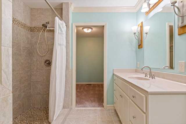 bathroom with tile patterned floors, a shower with curtain, crown molding, and vanity