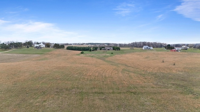 exterior space with a rural view