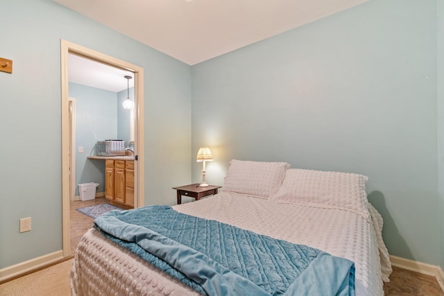 bedroom with light colored carpet