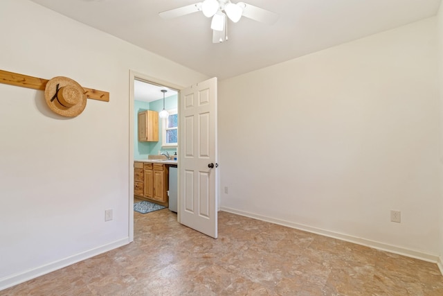 unfurnished room with ceiling fan