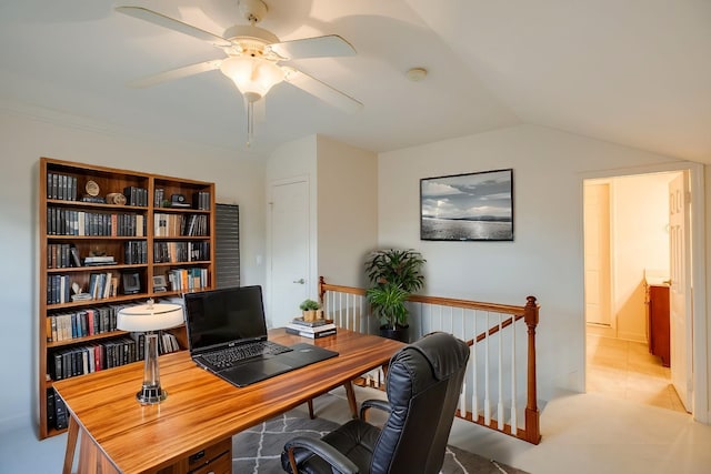 tiled home office with vaulted ceiling and ceiling fan