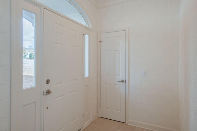 tiled entryway with ornamental molding