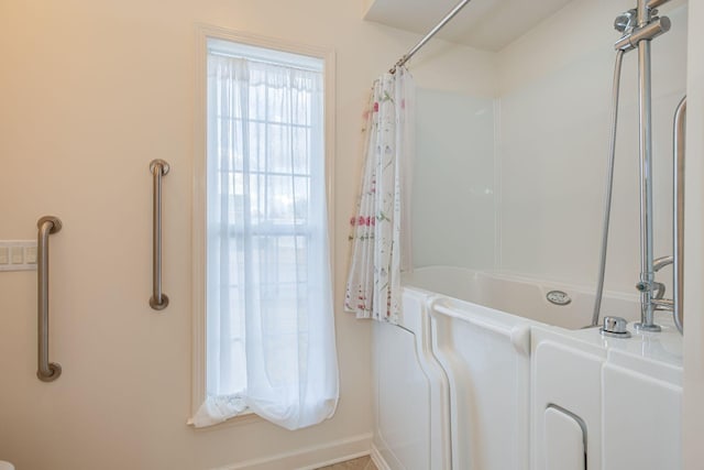 bathroom featuring shower / bathtub combination