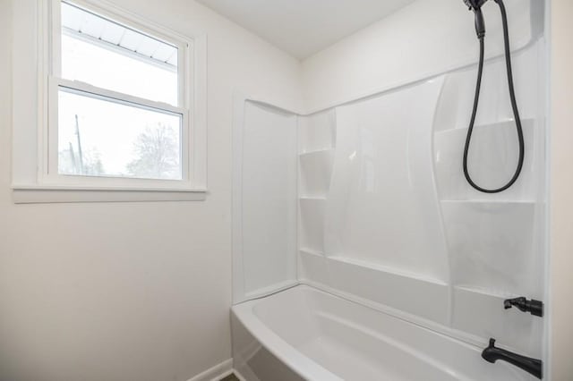 bathroom featuring bathing tub / shower combination