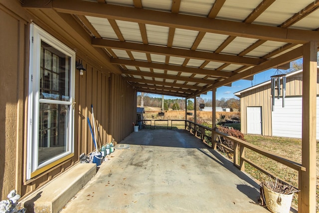 view of patio / terrace featuring a carport