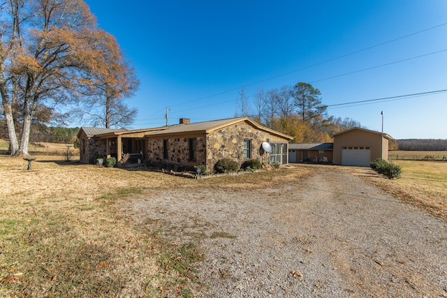 single story home with a garage