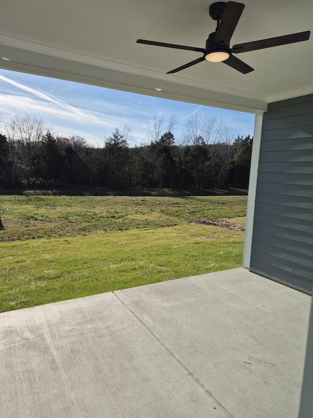 view of patio featuring a ceiling fan