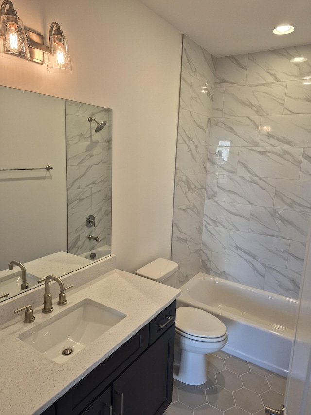 full bathroom featuring toilet, recessed lighting,  shower combination, and vanity