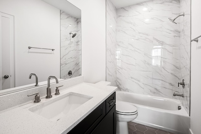 bathroom featuring toilet, bathtub / shower combination, and vanity