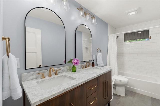 full bathroom with tile patterned flooring, vanity, shower / tub combo with curtain, and toilet