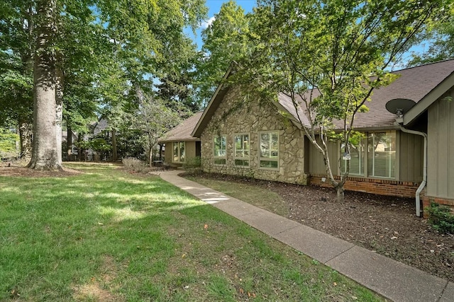 exterior space with a front yard