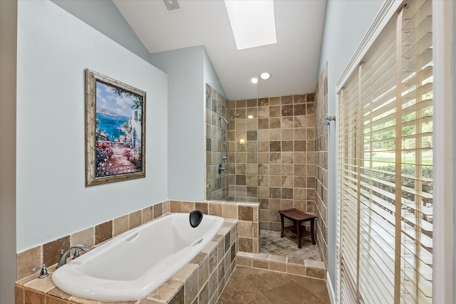 bathroom featuring tile patterned flooring and plus walk in shower